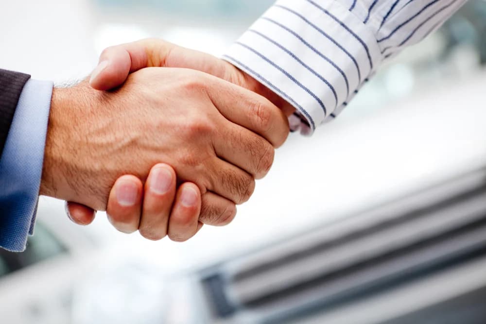 Business people handshaking