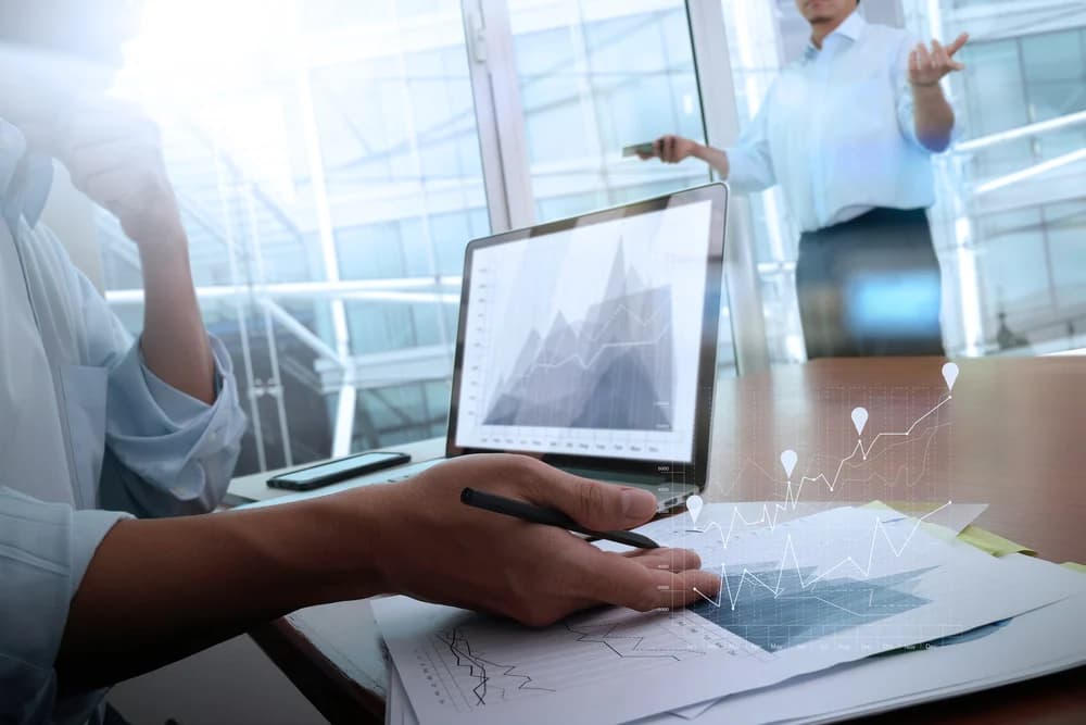 Image of man working on numbers